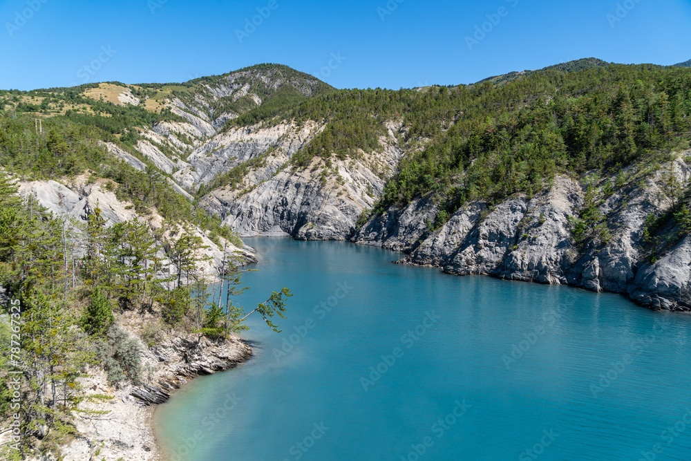 Beautiful summer landscape of the Lake of Serre-Poncon located and popular summer destination Beautiful summer landscape of the Lake of Serre-Poncon located and popular summer destination