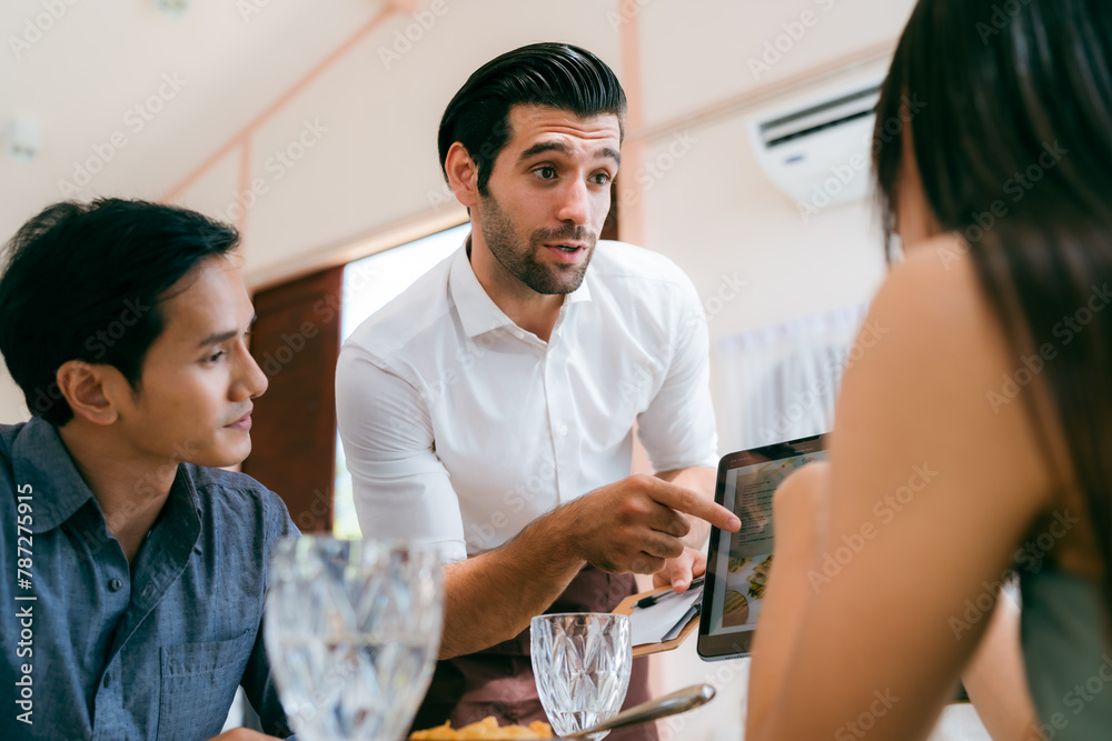 Engaging Service at the Eatery, Clients Enjoying Conversations while Waitstaff Attend, Cafe Scene Filled with Delicious Food and Beverages, Where Lifestyle Meets Business in Comfortable Dining
