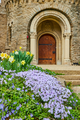 Fototapeta Naklejka Na Ścianę i Meble -  Spring Blossoms at Historic Stone Seminary Entrance