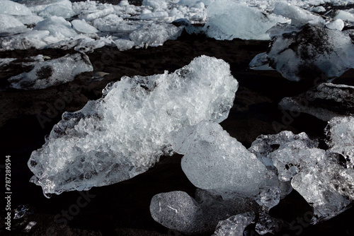 ice blocks on black diamond beach in Iceland  photo
