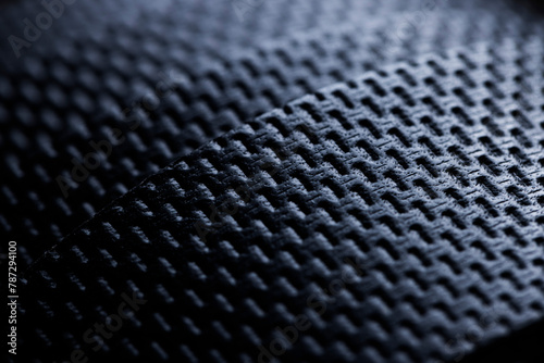 Close-up of the stamped pattern on a men's leather belt.