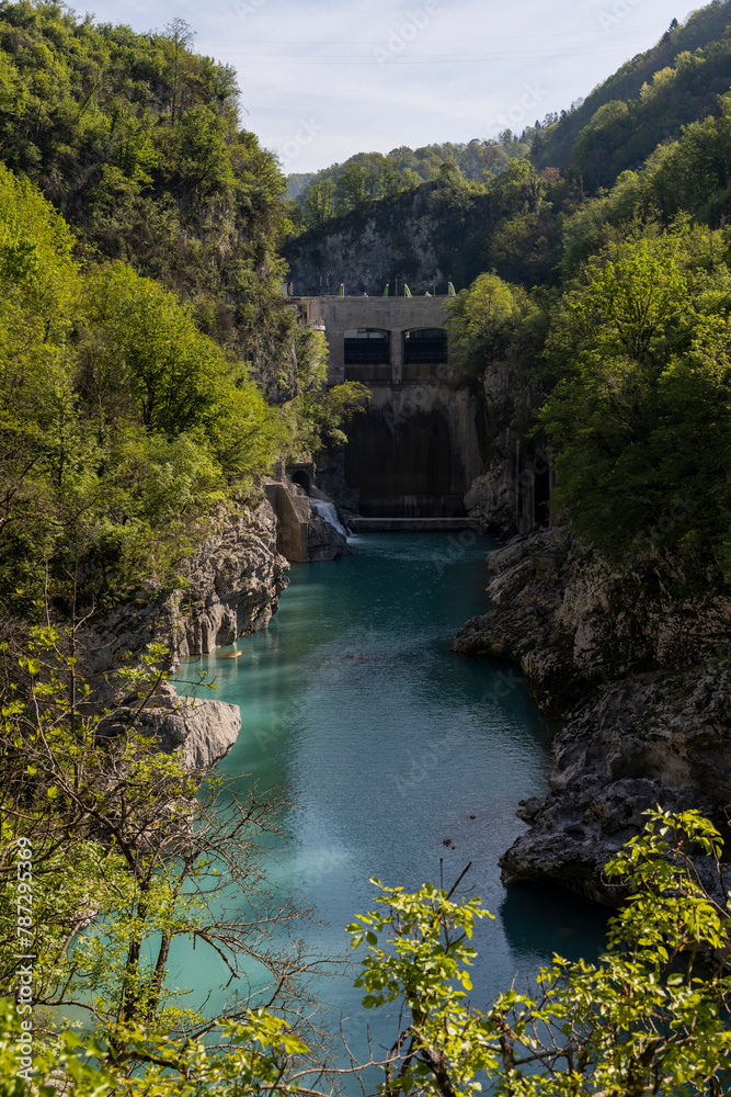 Kanal or Kanal ob Soč relaxing and small Slovenian village with a springboard to dive from the bridge. Small beach on the river with a view of the village from above. Slovenian landscapes. Nova Gorica