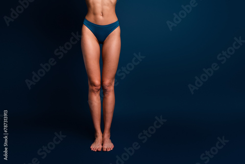 No retouch cropped photo of lady legs underwear lingerie accepting acne skin empty space isolated blue color background