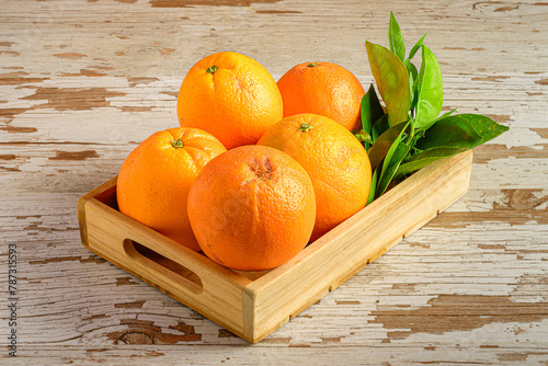 Rustic Wooden Box with Oranges