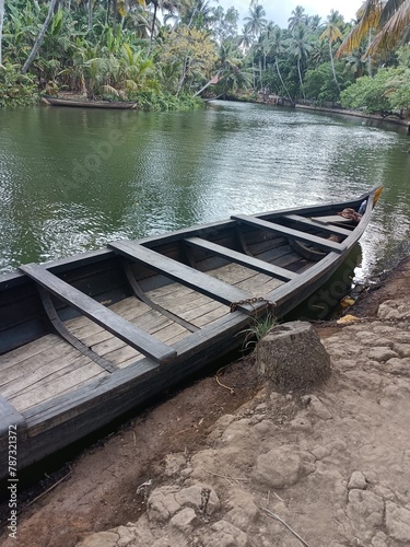 A canoe is a lightweight narrow water vessel, typically pointed at both ends and open on top, propelled by one or more seated or kneeling paddlers facing the direction of travel and using paddles.