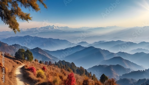 Panoramic landscape of great Himalayas mountain range during an autumn morning from Kausani also known as  Switzerland of India  a hill station in