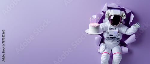 An astronaut smashing through signifies a cosmic birthday celebration complete with a floating cake photo