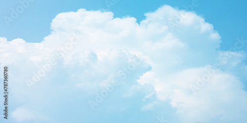 It's a hot day with the sun shining down on a blue sky filled with alternating small and huge clouds moving gently while the light from the sky creates a remarkable abstract shape. Horizon, Cloud Back