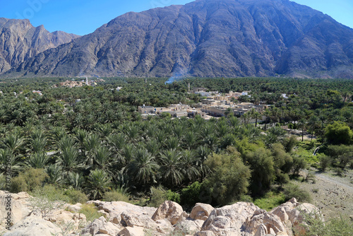 Nakhal oasis Al Hajar Hadschar mountains landscape with palm trees, Oman photo