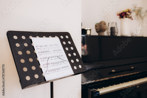 Music notes on piano indoors photo