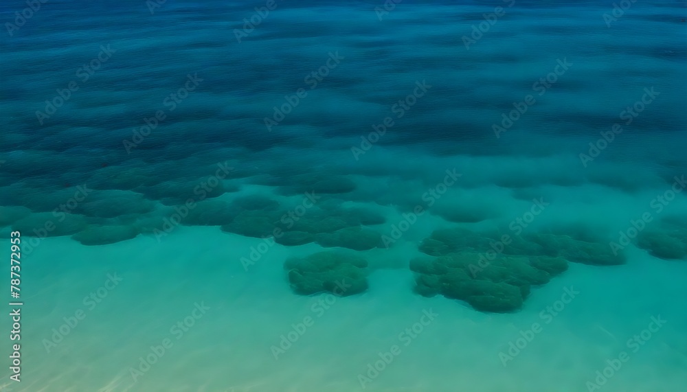 Clear ocean water with varying shades of blue and green