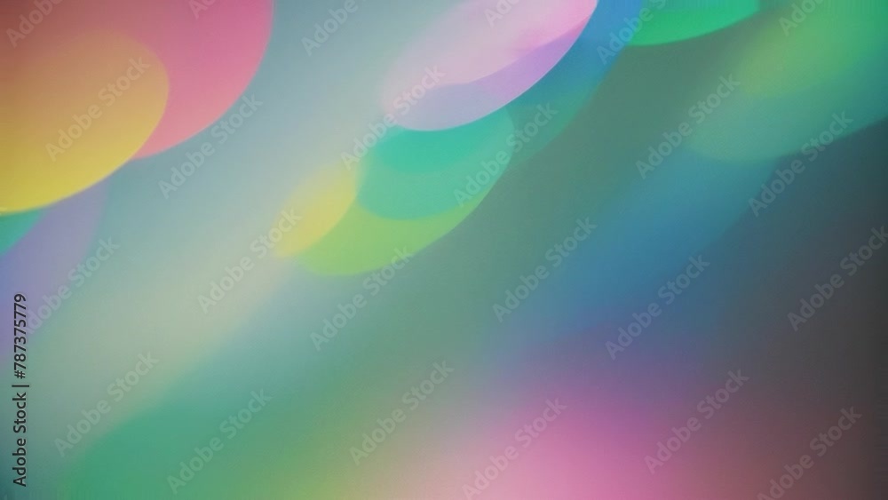 Soft focus of colorful bokeh lights on gradient background. Abstract image with dreamy blurred aesthetic.