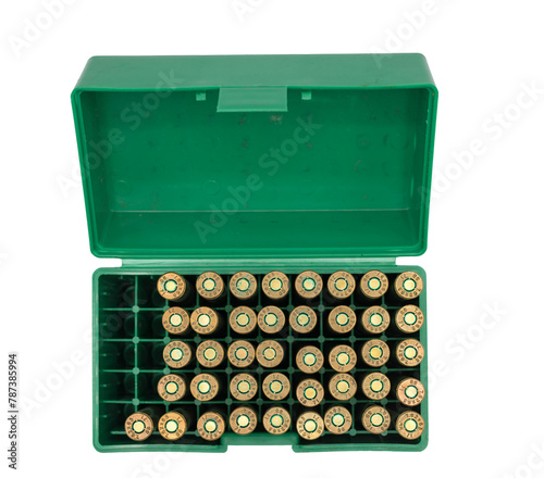 Top view of an open green plastic box with military rifle bullets caliber 30-06 springfield or 7.62x63mm on white background photo