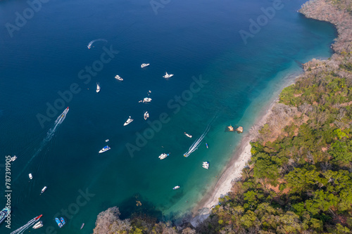 Fototapeta Naklejka Na Ścianę i Meble -  Beautiful aerial view of an impressive fishing luxury yacht in the Tortuga island in Costa Rica