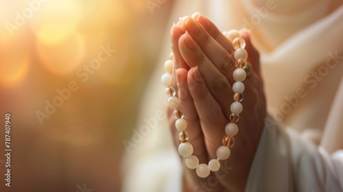 Hands Holding Prayer Beads