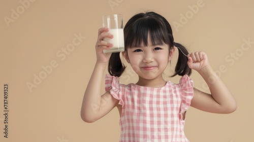 A Girl Enjoying a Glass of Milk