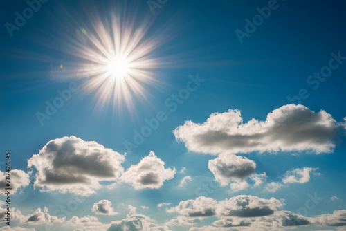 Sunny serenity blue sky with white clouds and radiant sun