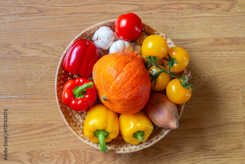 Basket, Bowl of colourful fruit and vegetables on a wooden table