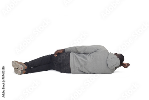 back view oa a man lying on the floor on white background photo
