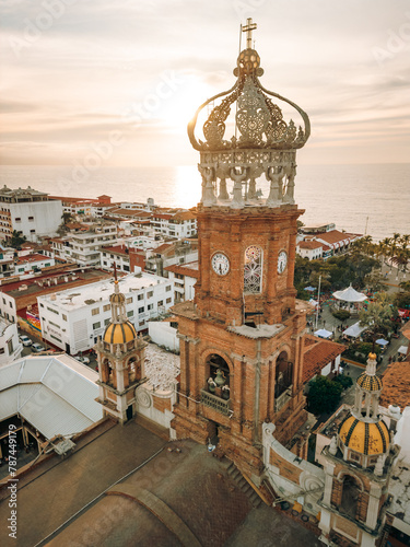 Close up vertical view of our Lady of Guadalupe church in Puerto Vallarta, Jalisco, Mexico at sunset photo