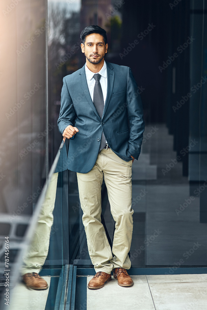 Office, balcony and portrait of confident businessman with career, pride and trust in business opportunity. Consultant, entrepreneur or urban man with window, ambition and professional job in city Office, balcony and portrait of confident businessman with career, pride and trust in business opportunity. Consultant, entrepreneur or urban man with window, ambition and professional job in city