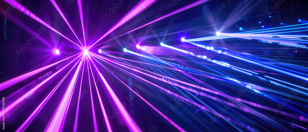Vibrant pink and blue light beam display