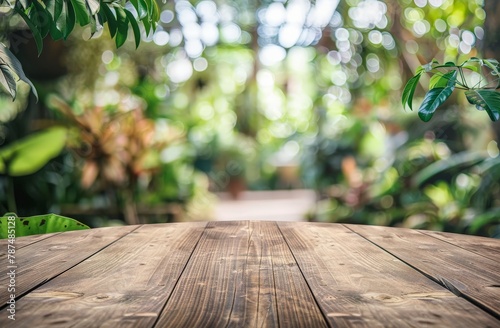 Wooden Table Surrounded by Greenery photo