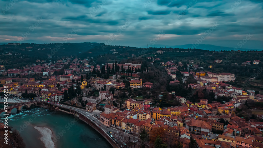 Aerial view of Verona and Adige river at sunset, Veneto region, Italy. Traditional Italian architecture