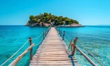 Stunning wooden bridge to a small island in the transparent turquoise sea water in Greece. A fantastic view of the sunny summer seascape with 