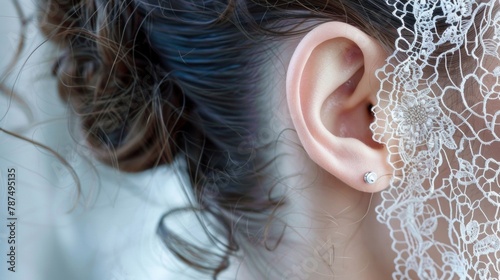 The delicate whorls of the outer ear resemble a piece of delicate lace adding a touch of elegance to the human form. .