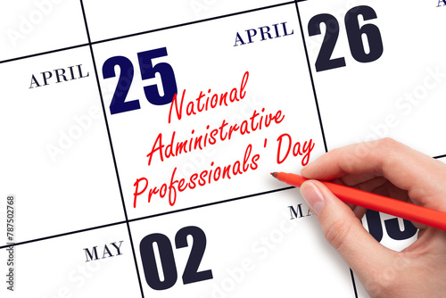 April 25. Hand writing text National Administrative Professionals' Day on calendar date. Save the date. © Alena