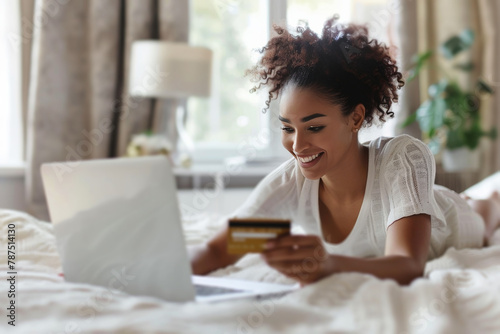 Woman Laying in Bed Using Laptop