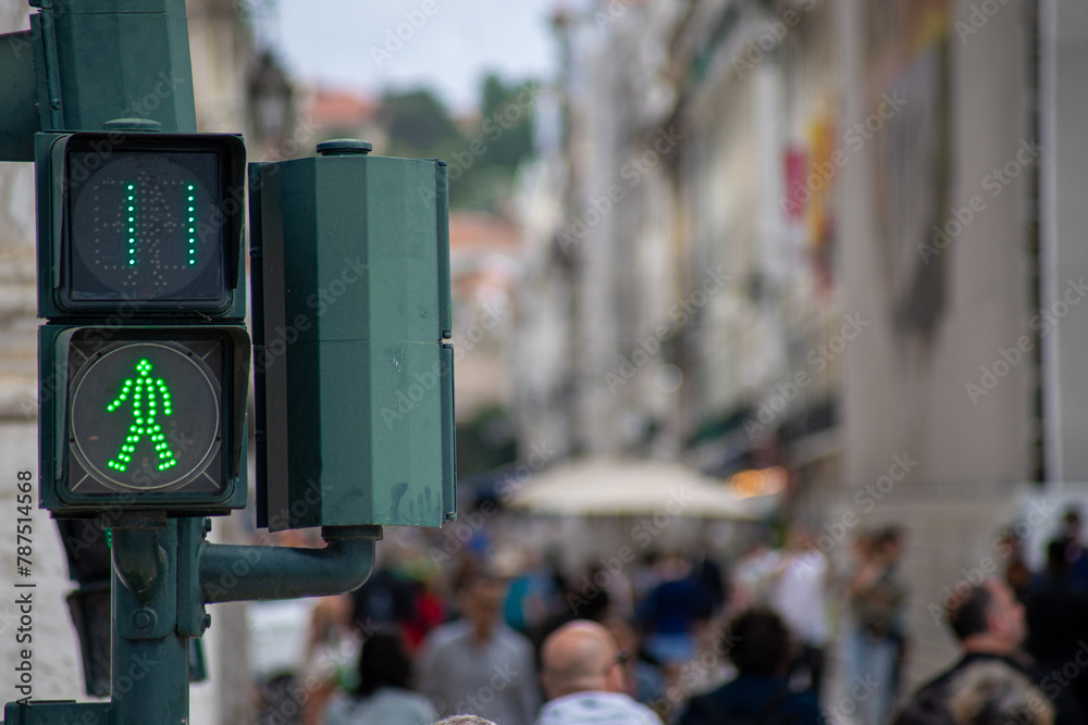 Green traffic light for pedestrians counting down in 11 seconds in Lisbon Green traffic light for pedestrians counting down in 11 seconds in Lisbon