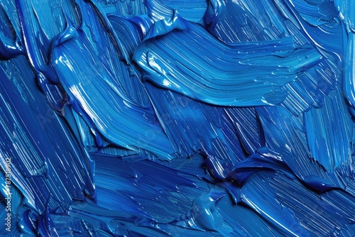 Blue background with oil paint texture. Beautiful close up brushstrokes. Detail of artistic abstract oil painted background.