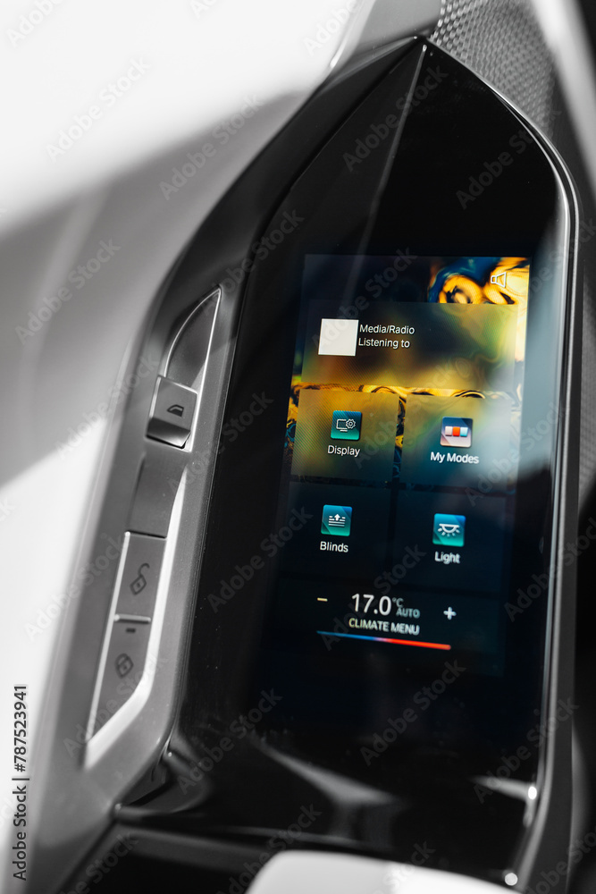 Obraz premium Modern luxury and expensive car control panel for rear sear row with LED touchscreen monitor
