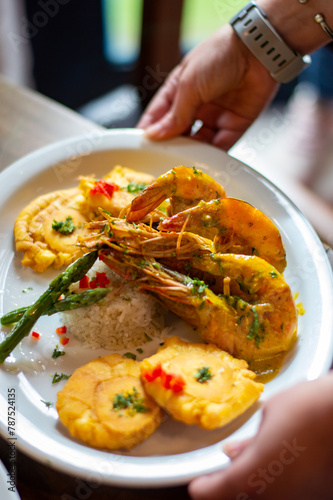 Ecuadorian traditional food: prawns with patacones © Milo Andrade Dávila