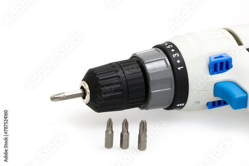 Screwdriver and bits isolated on a white background. A well-known symbol of assembly or repair.