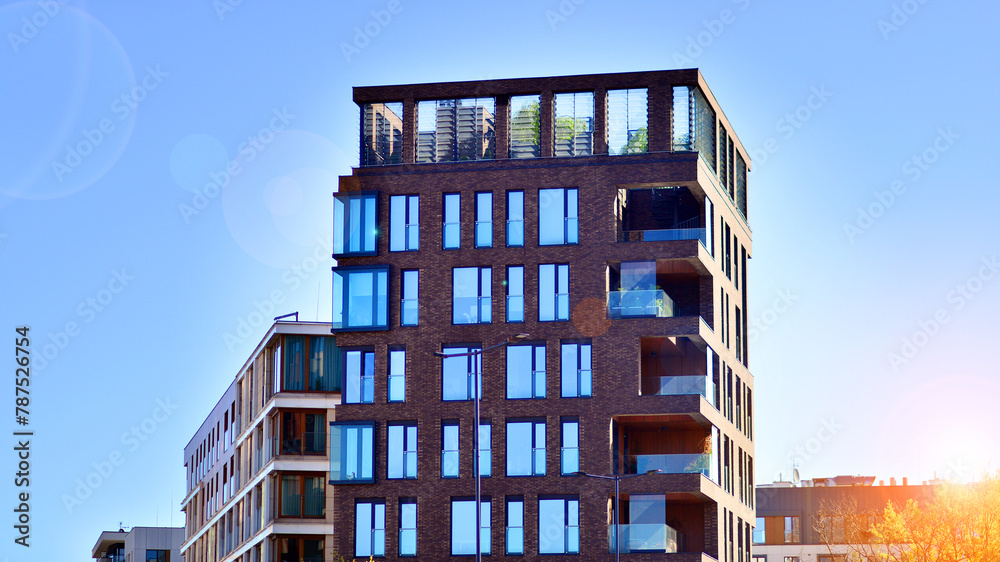Eco architecture. Green tree and new residential building. Harmony of ...