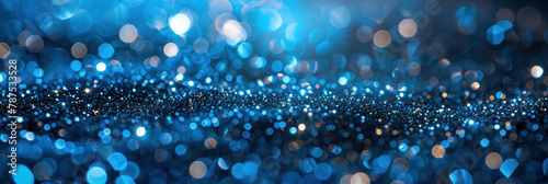 Abstract banner with shimmering blue and white light dots and bokeh effect.