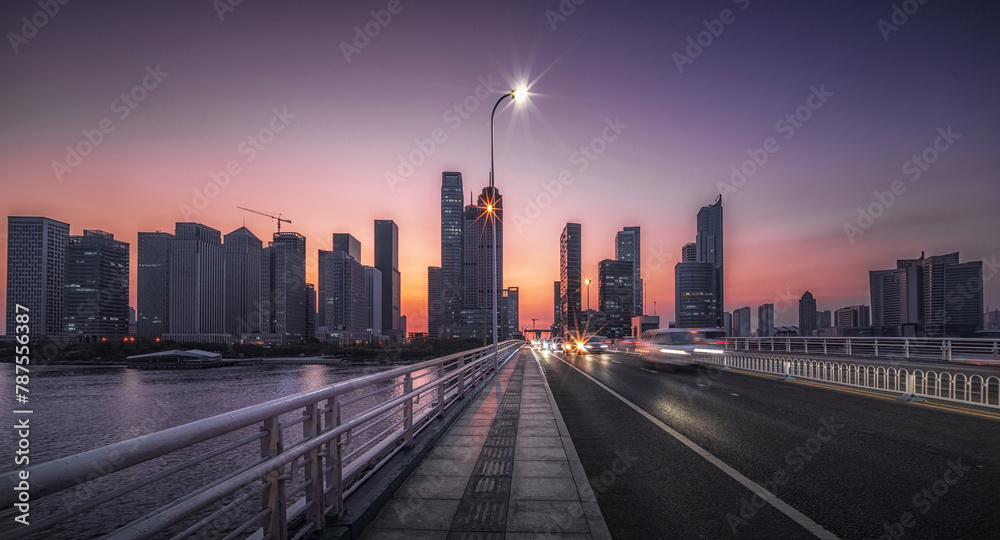 Urban Evening Glow on a Bustling City Bridge