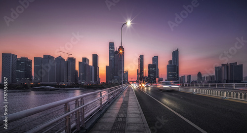 Urban Evening Glow on a Bustling City Bridge © evening_tao
