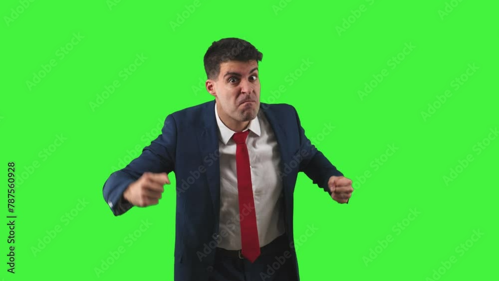 Furious Businessman Glaring at Camera with Clenched Fists white background Green Screen Chroma Key Furious Businessman Glaring at Camera with Clenched Fists white background Green Screen Chroma Key