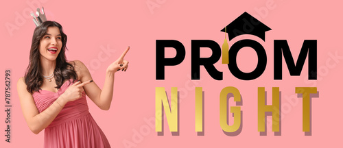 Beautiful young woman in stylish prom dress and paper crown pointing at something on pink background
