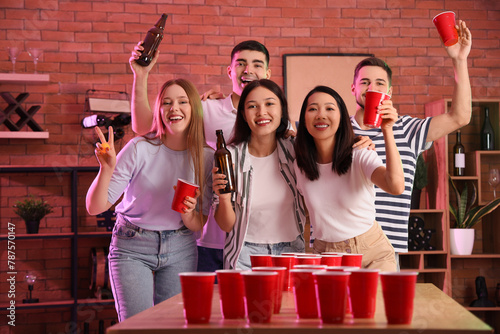 Group of young friends play...