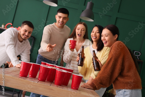 Group of young friends play...