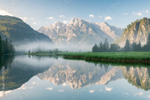 Alpine lake with reflection, fog atmosphere, Totes Gebirge, Gruenau, Almtal, Salzkammergut, Upper Austria, Austria, Europe photo