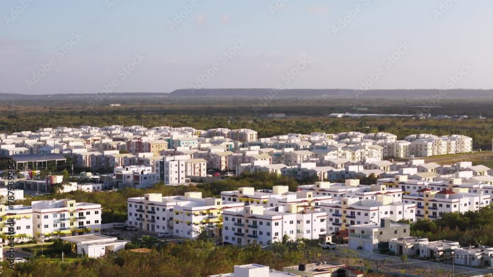 Aerial view of many 3 story apartment buildings in the suburb. Budget-friendly home loan for young families Aerial view of many 3 story apartment buildings in the suburb. Budget-friendly home loan for young families