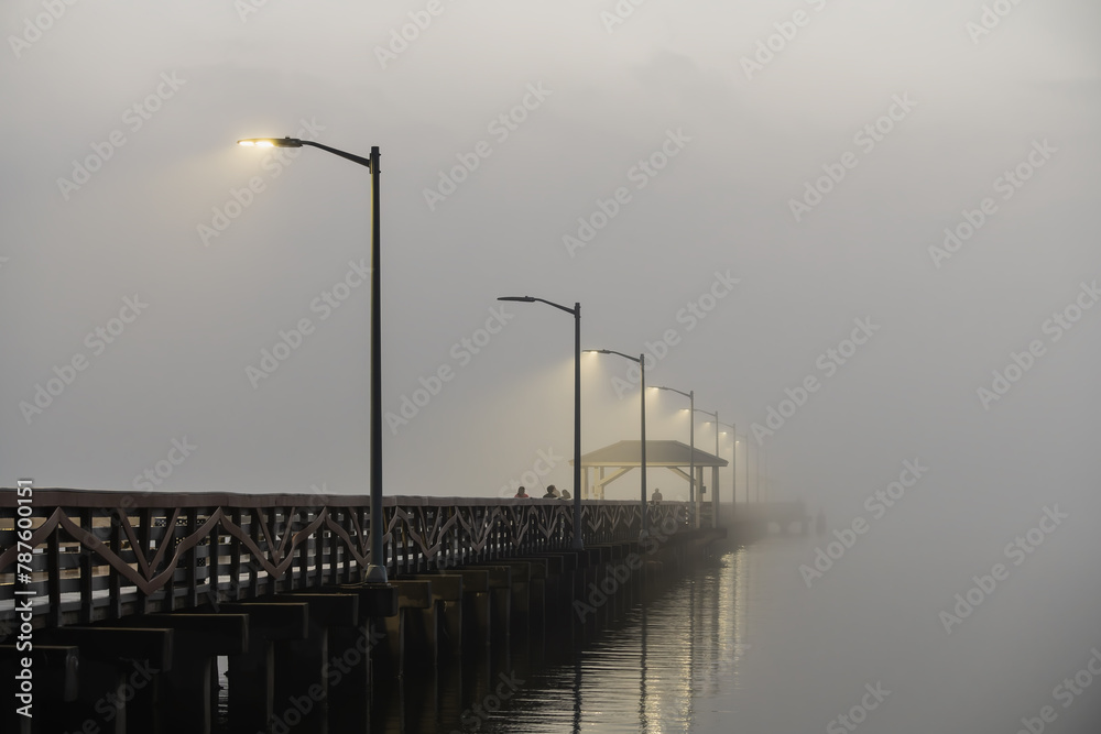 Foggy morning Ballast Point pier Tampa Florida, People walking