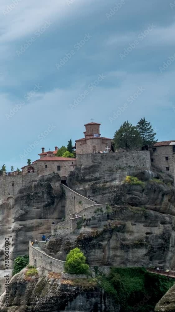 Timelapse of Monastery of Great Meteoron monastery in famous greek tourist destination Meteora in Greece. Camera zoom out effect Timelapse of Monastery of Great Meteoron monastery in famous greek tourist destination Meteora in Greece. Camera zoom out effect
