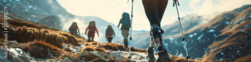 A person with a prosthetic leg smiling while hiking in the mountains with friends photo